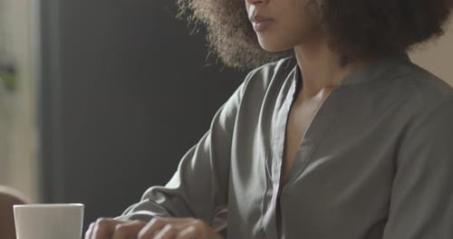 African American businesswoman working from home