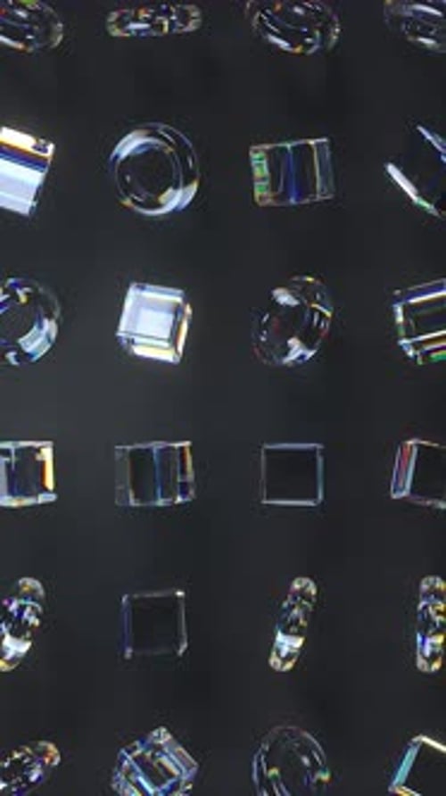 3d glass rotating cubes and torus with dispersion effect.