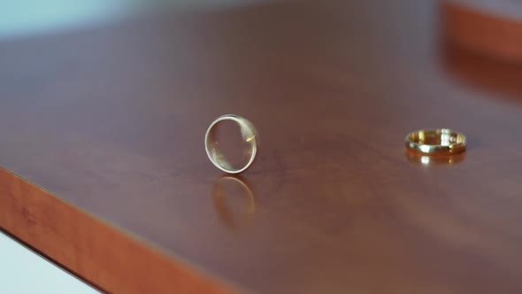 Wedding ring spinning in slow motion, close up shot, Industrial Stock ...