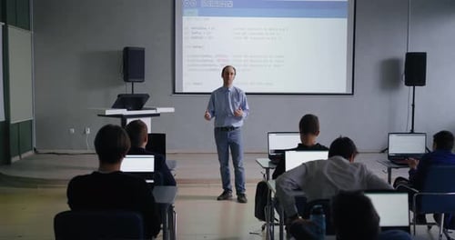 Modern ComputerBased Classroom In Contemporary School Teens Boys Studying Computer Science
