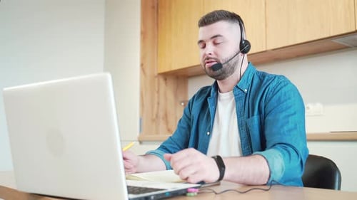 Man Having Video Call at Home Workplace