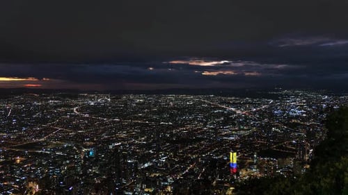 Bogota Colombia city at night timelapse Monserrate mountain viewpoint South America