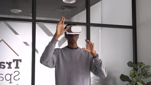 Creative Businessman Using Virtual Reality Sir in Office Adult