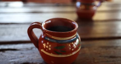 Steaming Drink in Hand Painted Terracotta Mug