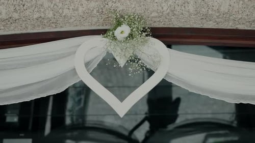 Wedding Car Decorated with Heart and Flowers