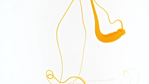 Color Yellow Paint Drops in Water Abstract Color Mix Drop of Ink Color Mix Paint Falling on Water