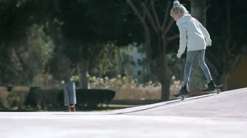 Girl Riding on Waveboard with Two Wheels Modern Street Skate Sports of Teenagers Casterboard or