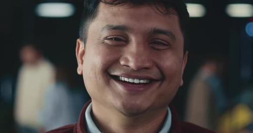 Smiling Man Close Up Portrait in Office Environment