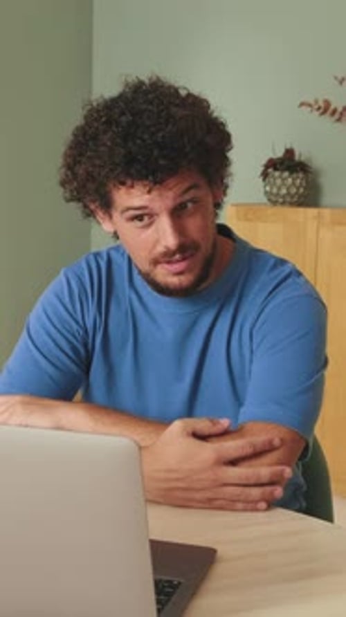 Young Adult on Video Call at Home