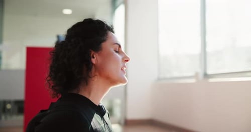 Woman, tired or drinking water in gym for fitness, hydration or electrolytes for healthy body