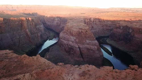 Aerial Shot Of Horseshoe Bend At Sunset With Tourists At Lookout Vantage Point, Arizona