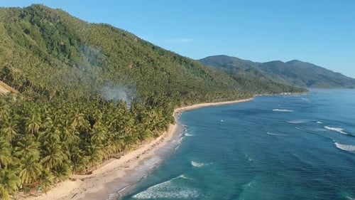 Mountain side landscape by the sea side with ocean waves