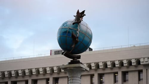 View of the Globus Statue in Independence Square, Kyiv, Ukraine - Landmark and City Symbol
