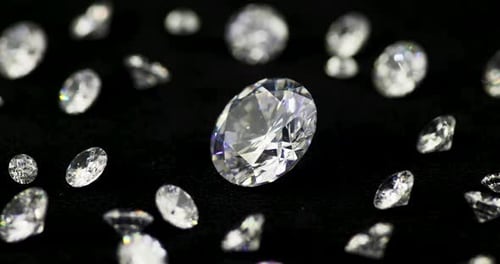 Diamonds Glitters on Black Background in Close Up