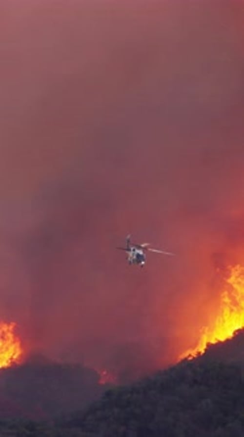 Emergency Helicopter Response to Wildfire Situation in Malibu Los Angeles