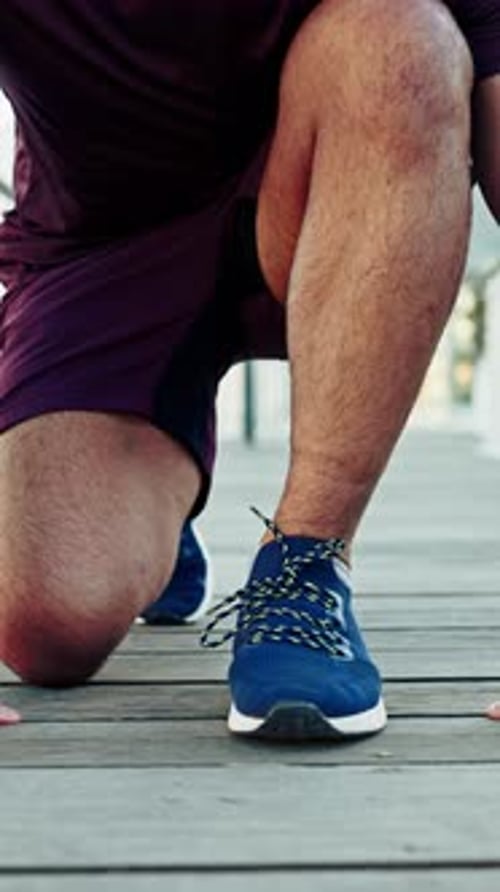 Hands, runner and tie with shoelace in city with fitness, start and posture for launch with speed