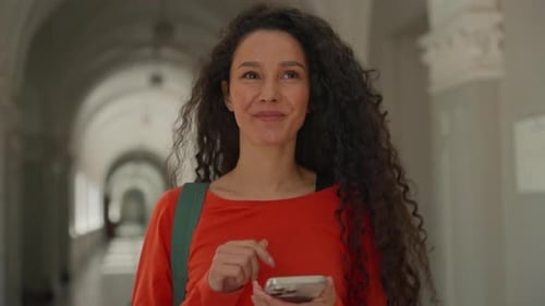 Hispanic Happy Student Girl Female Woman Walking in Corridor College High School University Hall