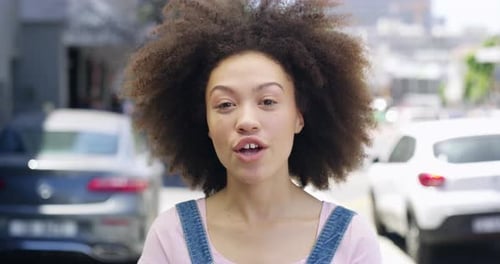 4k video footage of a young woman being interviewed on the street