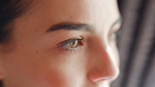 Woman's Face in Extreme Close Up, Green Eyes