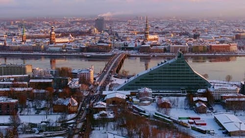 Golden Hour Over Riga Cityscape - National Library, Historical Skyline, Drone