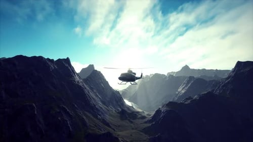 A Helicopter is Flying Over a Mountain Range