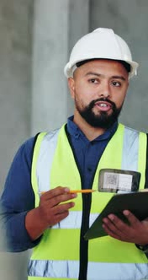 Engineering, conversation and man with clipboard, construction site for building project and safety