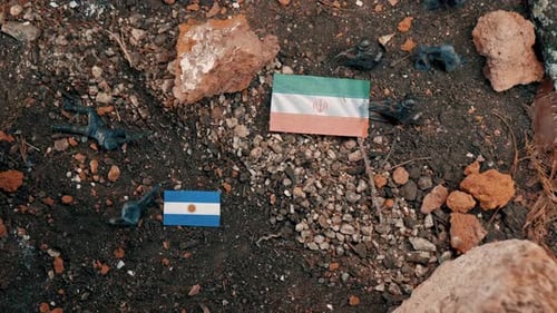 War conflict between argentina and iran with toy soldiers