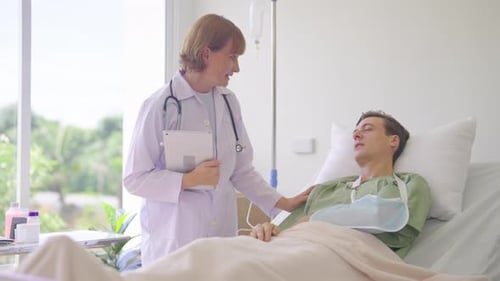 Doctor stand beside of patient bed then use stethoscope to check symptom of patient