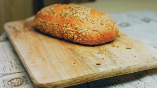 Fresh Multigrain Bread on Wooden Cutting Board