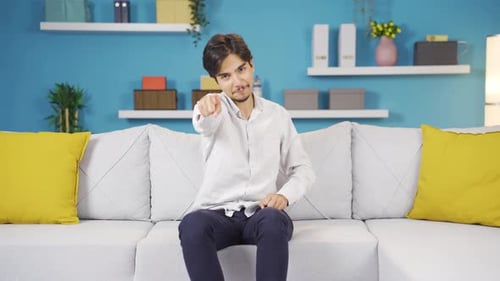 Happy man dancing to the camera.