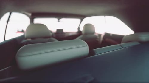 Modern Car Interior Moving Footage from Back Seat