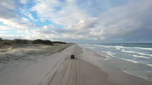 Aerial view of Main Beach with vehicle tracks, Australia.