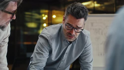 Team of Office Workers Discussing Startup Project