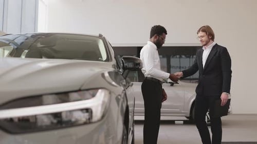 Car Showroom Man Purchasing New Car