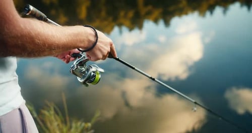 Fisherman Fishing On The River