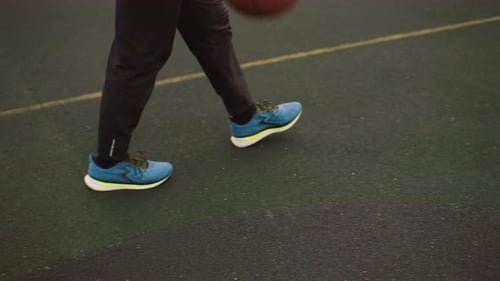 Basketball Dribbling Practice on Outdoor Court