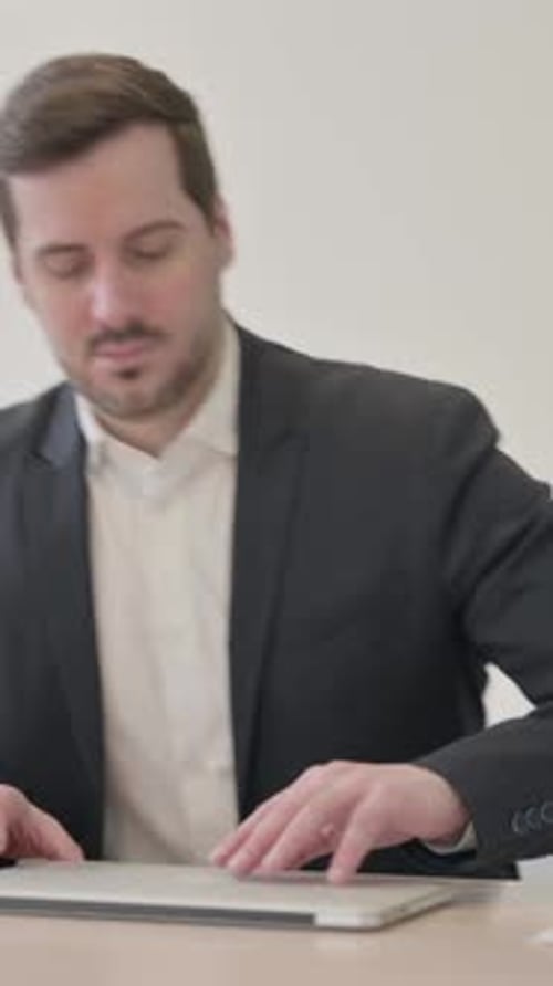 Businessman Coming Back to Office for Work, vertical video