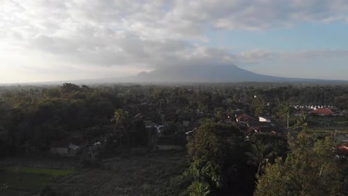 Aerial Shot of Tropical Village with Mountain View