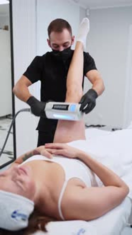 Woman receiving medical treatment in a modern clinic