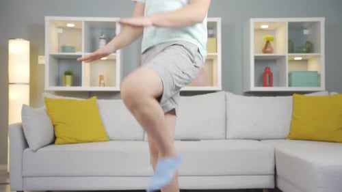Young Adult Doing Leg Exercise at Home
