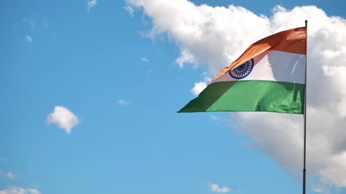 Indian Flag Waving in the Wind on a Sunny Day