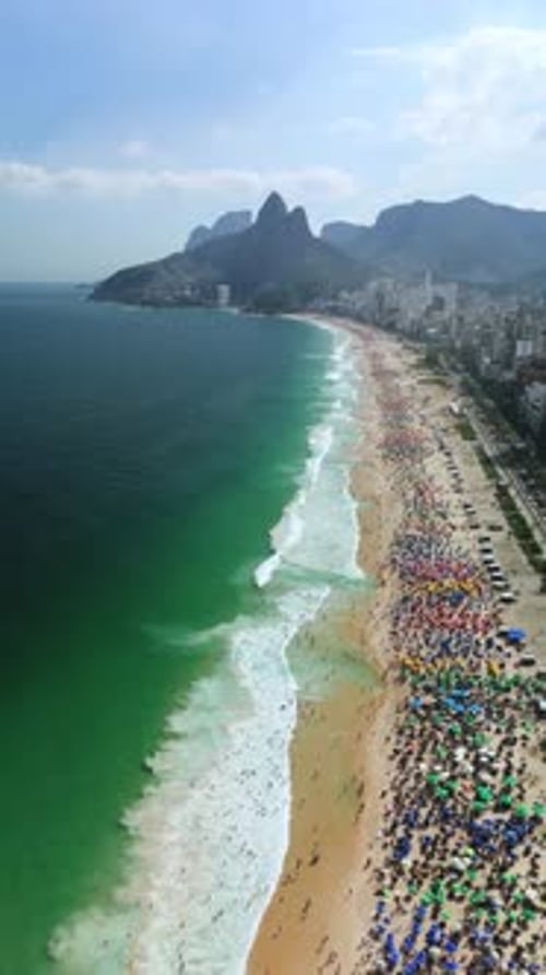 Vertical Flyover Above Umbrella-Packed Ipanema Beach, Rio de Janeiro