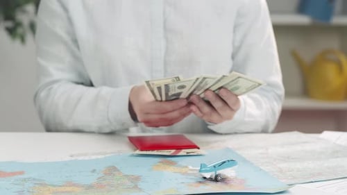 Cash Exchanged for Passport at Travel Meeting