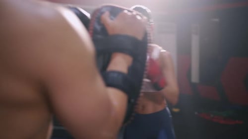 Athletic Woman Boxing Workout at the Gym