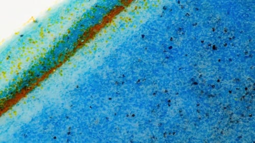 Multi Colored Sand Texture Macro Close Up Colourful Background with Pouring Falling Sand and Water