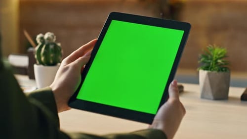 Manager Watching Chroma Key Tablet at Desk Close Up Hands Holding Green Screen