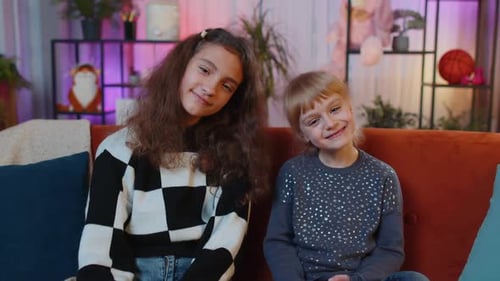 Teen and Child Resting Together on Couch