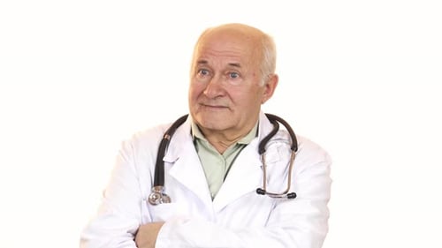 Older Doctor Standing with Arms Crossed