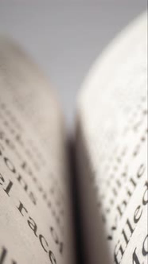 Pages of a Book Flipping in Close Up