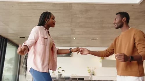 Happy Couple Dancing Together at Home, Laughing